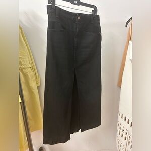 KHAITE Neer Black Maxi Skirt with Middle Slit